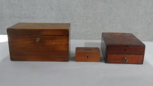 Three mahogany boxes, including a converted tea caddy, an offertory or safe box, and a flame
