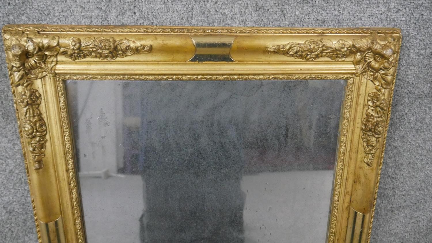 A 19th century gilt framed wall mirror, of rectangular form, the corners decorated with abundant - Image 2 of 5