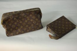 A Monogram Macassar Toiletry bag and zip up monogrammed pouch, with gold fittings. H.17 W.30cm.