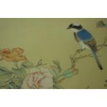 A gilt framed and glazed 20th century Chinese watercolour on silk of song bird with peonies, with