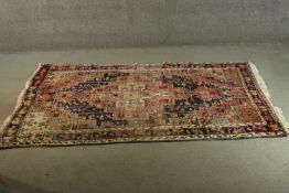 A blue ground handmade Persian Hamadan rug. L.198 W.126cm.