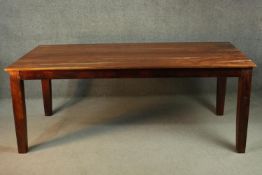 A mango wood rectangular refectory dining table, on square section tapering legs. H.78 W.200 D.95cm.