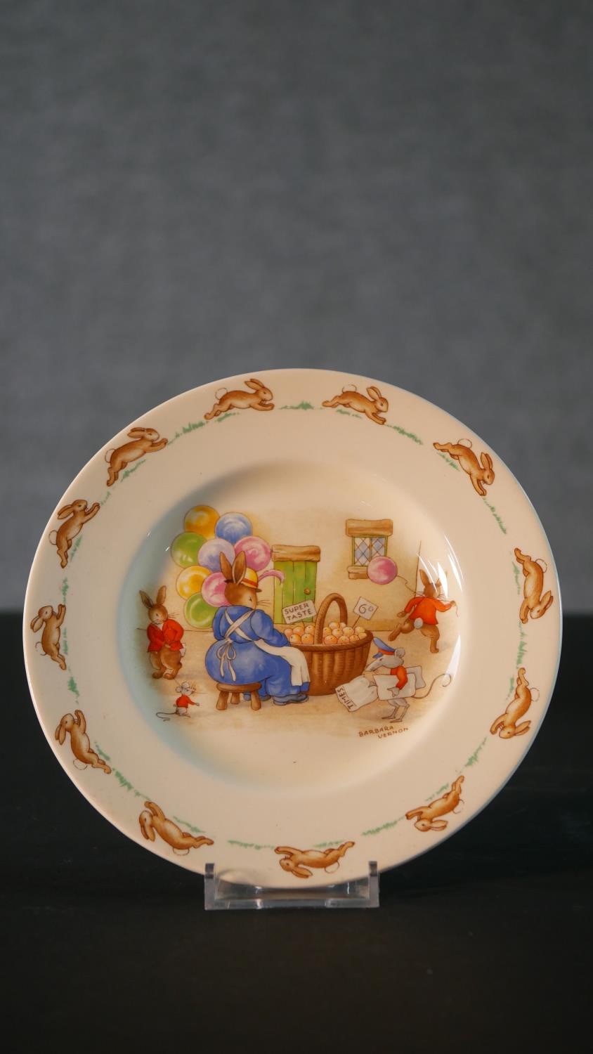 A collection of Royal Doulton Bunnykins pattern child's crockery, includes three cups, a moneybox, a - Image 7 of 16