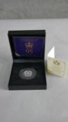 A boxed silver sovereign, Her Majesty The Queen's 95th Birthday, with COA. H.2 W.9cm