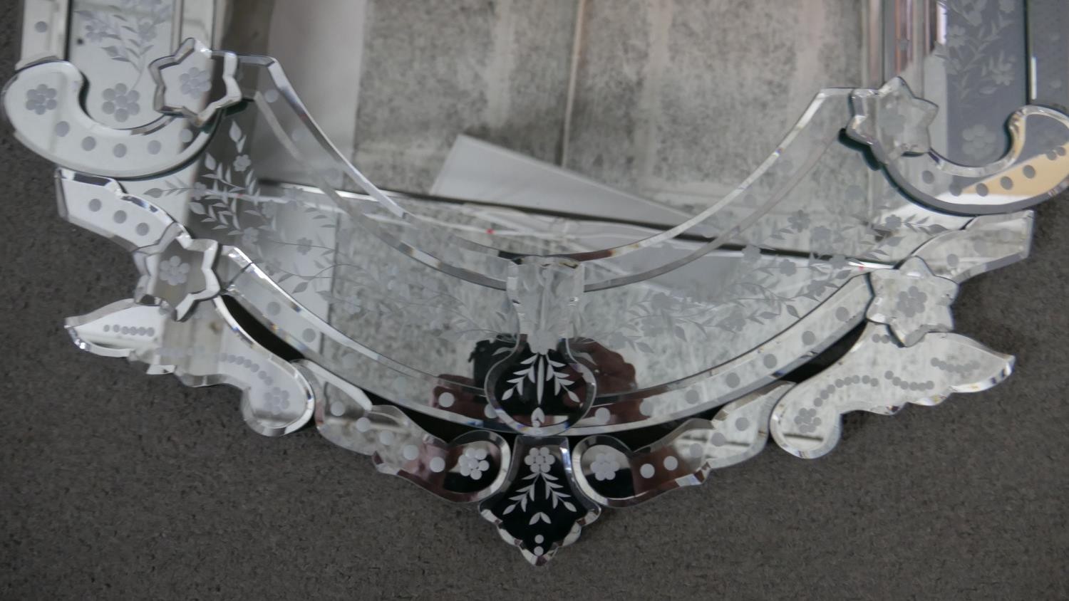 A Venetian style wall mirror, the ornate mirrored frame with bevelled edges and etched foliate - Image 2 of 4