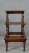 A set of Victorian style mahogany library steps, the three steps on scrolling supports, with