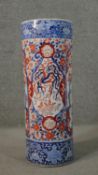 A 20th century Chinese hand painted porcelain cylindrical stick stand, decorated with phoenix and