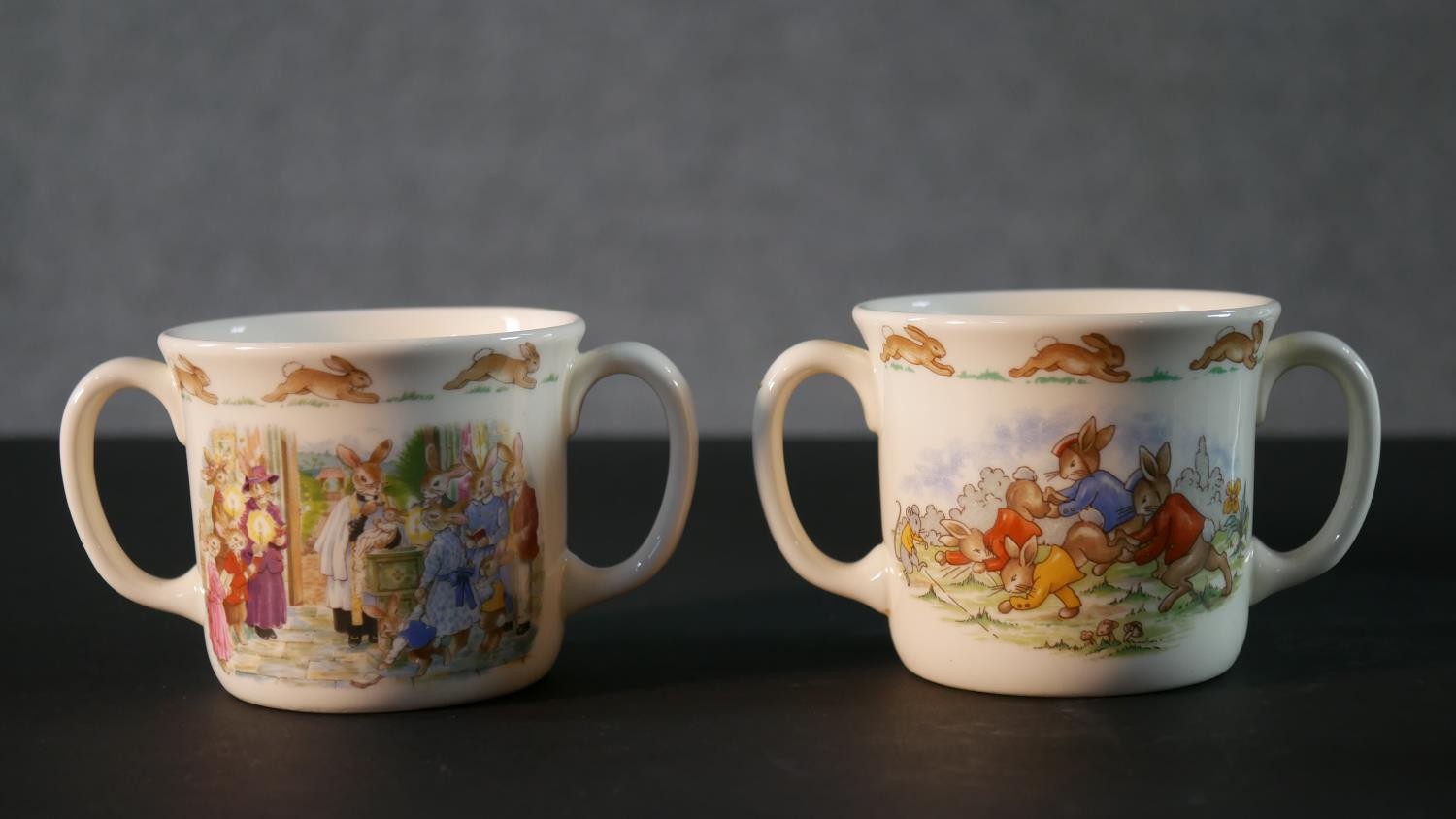 A collection of Royal Doulton Bunnykins pattern child's crockery, includes three cups, a moneybox, a - Image 3 of 16