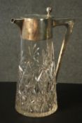 A late 19th century German silver mounted claret jug, the hand cut crystal body of tapered