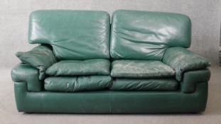 A leather upholstered Roche Bobois two seater sofa. H.79 W.163 W.53cm