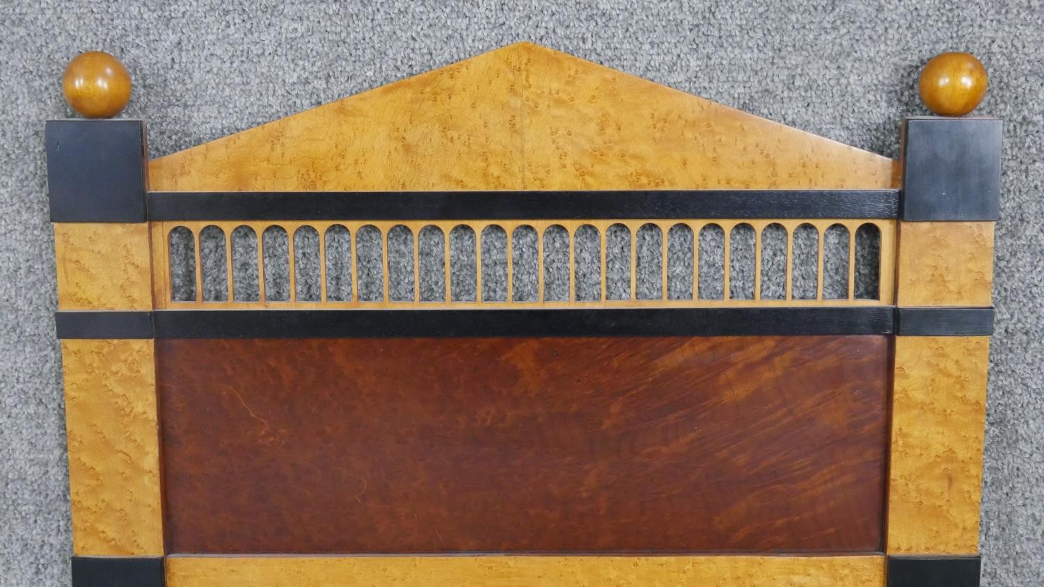 A pair of Biedermeier style birds eye maple mirrors, with an arched top flanked by gilded spheres, - Image 3 of 5