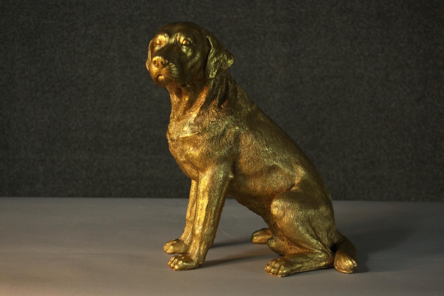 A gilded resin sculpture of a seated Labrador. H.15cm. - Image 2 of 4