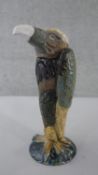 A Burslem Pottery grotesque bird figure lidded jar 'Vincent the Vulture', inspired by the Martin