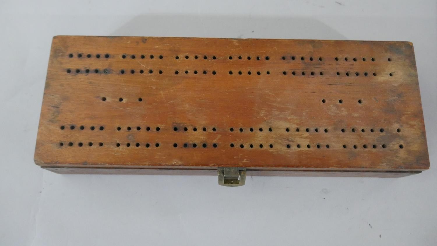 An early 20th century games box, with dominoes, cards and a cribbage set along with a marquetry - Image 4 of 6