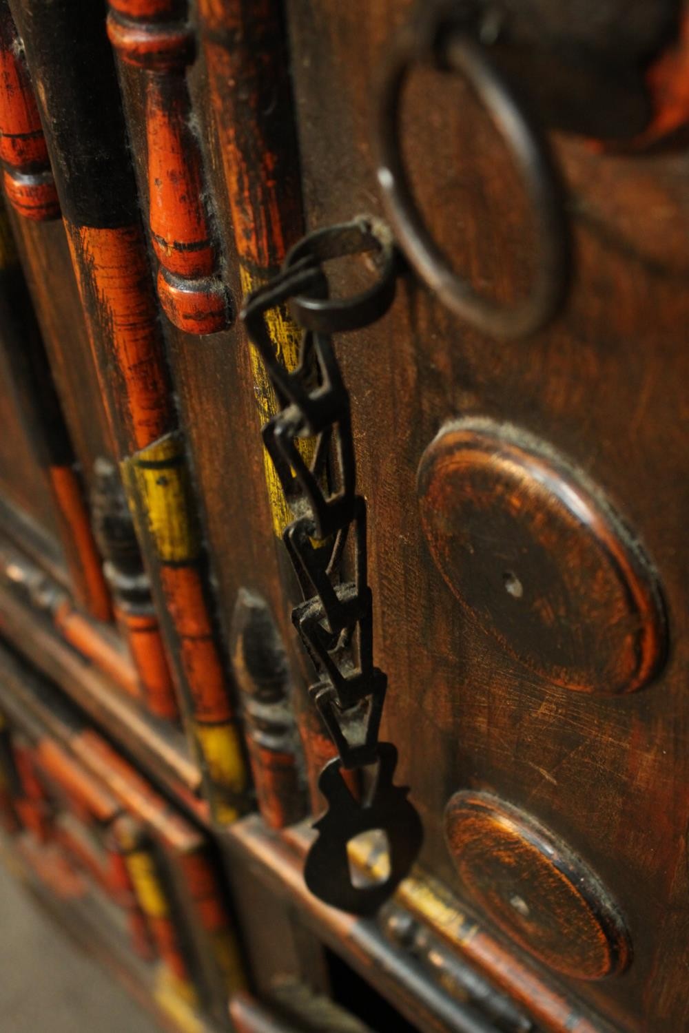 An Indian polychrome painted hardwood cupboard, with an arch top over two pairs of cupboard doors, - Image 6 of 7