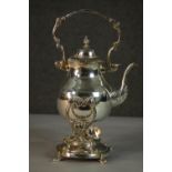 A Victorian engraved silver plated spirit kettle on stand with burner. H.30 W.17cm.