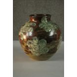 An art pottery glazed vase with floral design, signed Bernard to base and with potters label. H.23