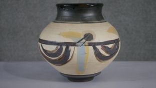 A large studio pottery Native American inspired design vase, impressed mark to the base. H.26 W.26cm