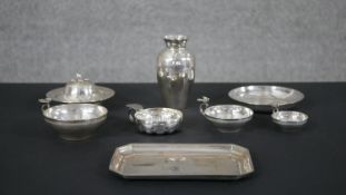 A collection of silver and silver plate, including a silver plate sommelier cup, a small vase and