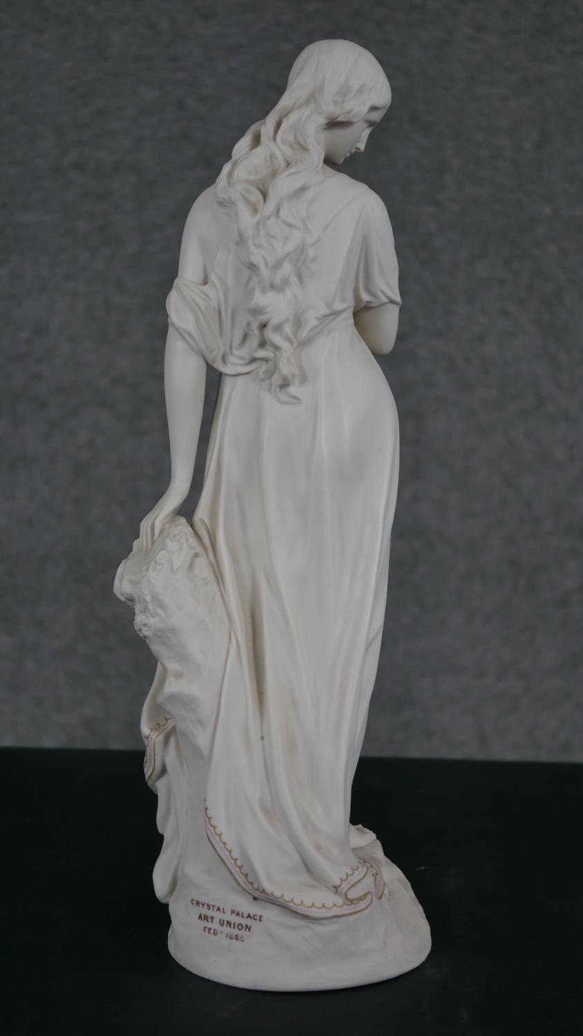 A Copeland Parian ware figure of a girl standing holding a flower to her breast, gilt border to - Image 3 of 12