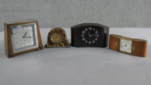 Four Art Deco clocks, including a tortoiseshell effect Bakelite clock, a John D Francis chrome and