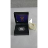 A boxed silver sovereign, Her Majesty The Queen's 95th Birthday, with COA. H.2 W.9cm