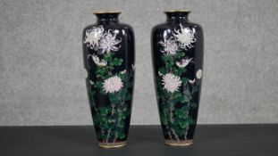 A pair of Meji period Japanese cloisonné enamel vases of tapering shape, with Chrysanthemums on