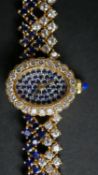 A gem-set watch, Bueche-Girod for Roy King. A Sapphire set dial, diamond-set bezel, to an