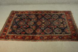 A Persian Kurdish blue ground hand made rug. L.206 W.132cm.