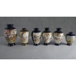 Six Japanese hand painted Satsuma ware vases, decorated with geisha girls and character marks to