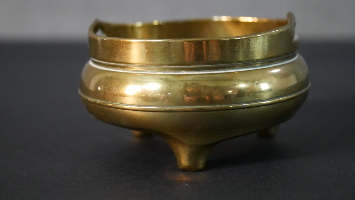 A 20th century miniature Chinese brass censer. H.6 Diam.9cm