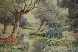 Theresa Sylvester Stannard (British, 1898-1947), a framed and glazed watercolour of summer view of a