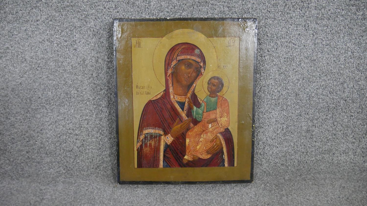 A 19th century hand painted Russian icon on panel, The Virgin Hodigitria. H.31.5 W.6 W.2.5cm