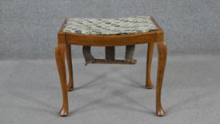 A George II style walnut stool, on cabriole legs with pad feet. H.43 W.55 D.39cm