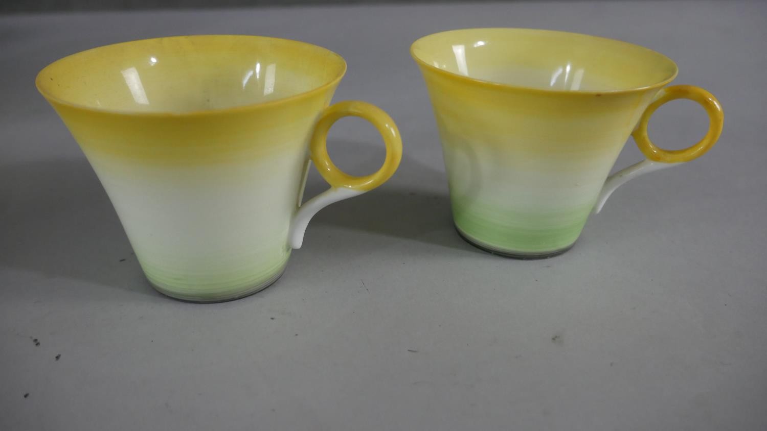 An Art Deco Shelly hand painted green and yellow porcelain tea set for six people. Makers mark to - Image 2 of 8