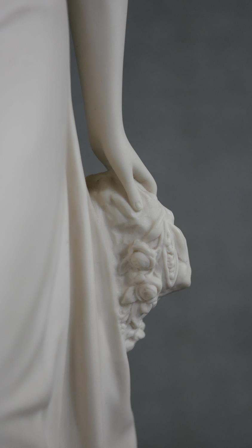 A Copeland Parian ware figure of a girl standing holding a flower to her breast, gilt border to - Image 6 of 12