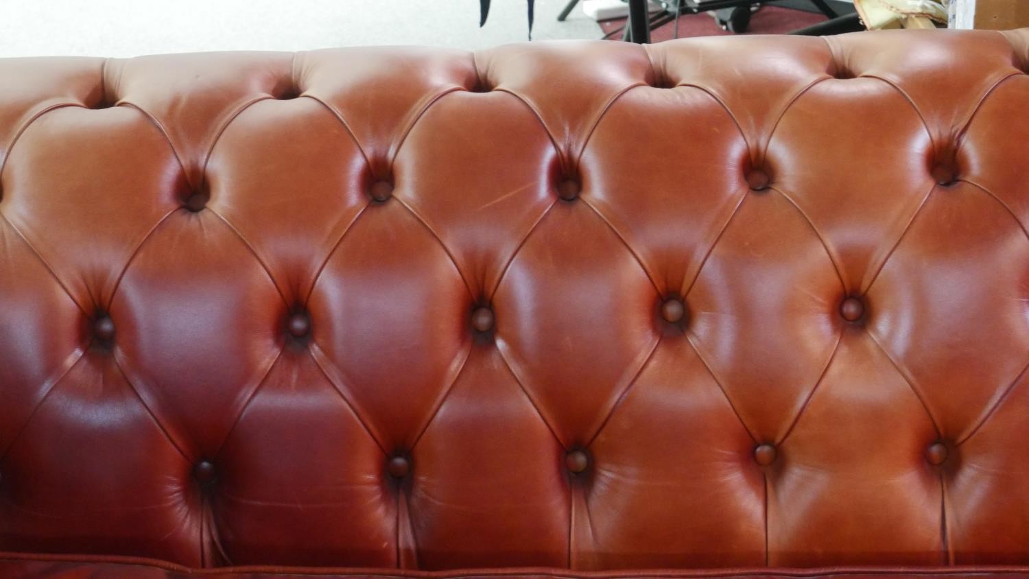 A large red leather Chesterfield sofa, with a button back and scroll arms, together with a leather - Image 4 of 8