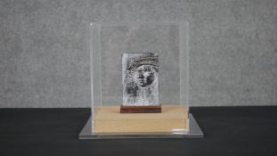 A perspex cased 21st century bronze double sided portrait sculpture. Unsigned. H.13.5 W.9.5 D.3cm