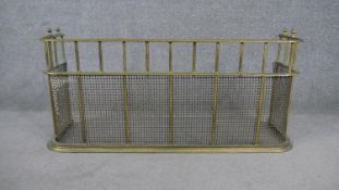 A 19th century brass fire guard, with curved corners, the bottom two thirds with mesh panels. H.47