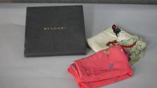 A collection of vintage scarves. One boxed grey branded design Bulgari scarf along with two other