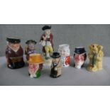 Eight early 20th century hand painted ceramic Toby jugs, various characters and makers. H.28 W.