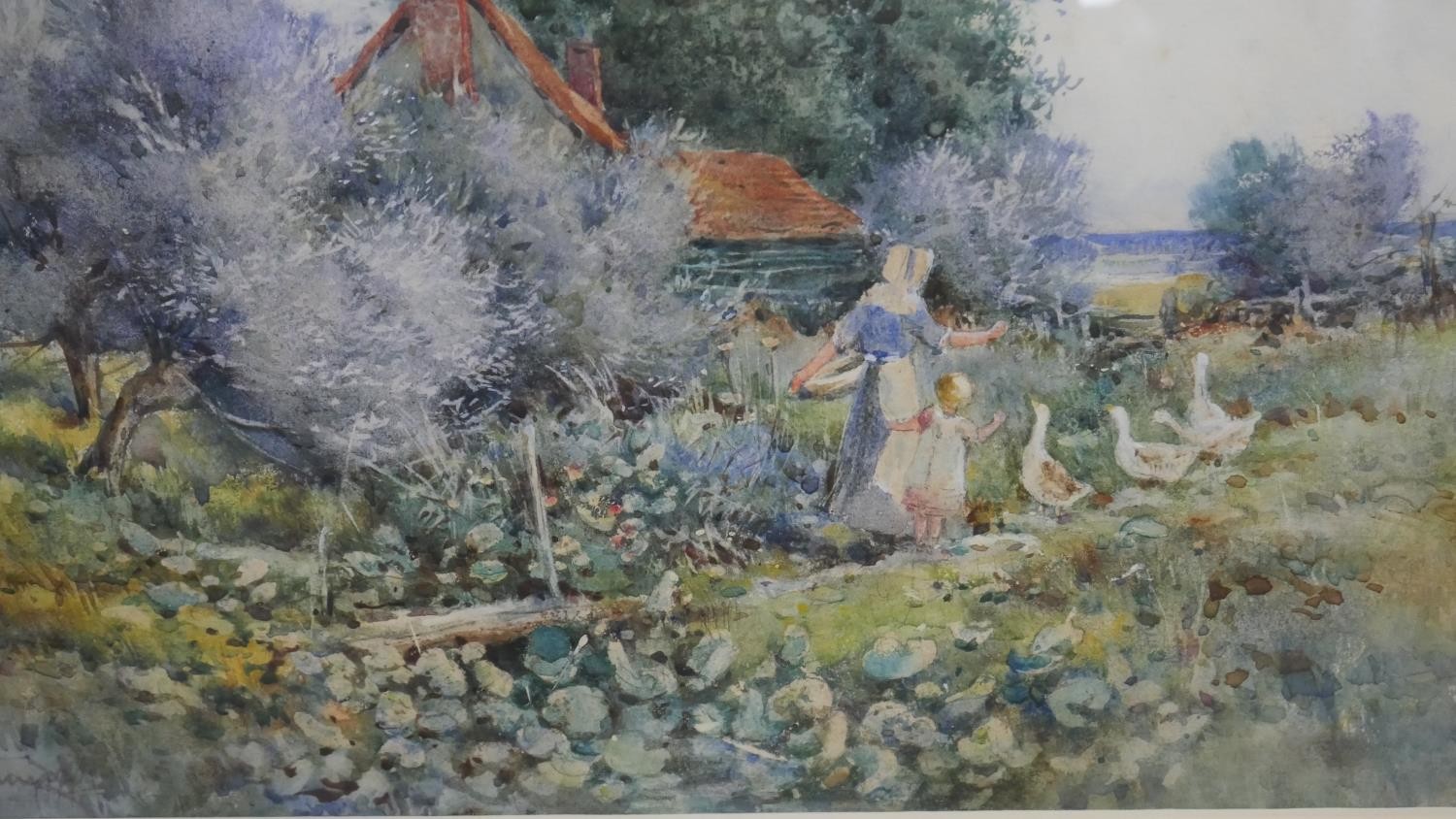 Emily Stannard (British 1875-1907), woman feeding ducks, watercolour, signed lower left. H.44 W.52cm