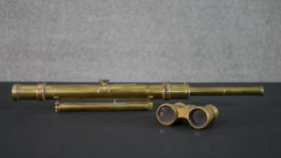 A 19th century brass telescope and opera glasses with relief writing decoration. L.54cm (Largest)