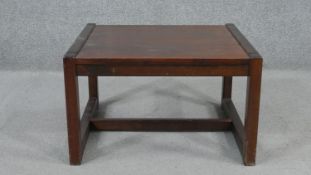A fruitwood coffee table, of square form, the legs joined by H stretchers. H.37 W.57 D.62cm