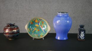 A collection of ceramics, including a lustre vase signed to base, a blue glaze vase signed J.W.