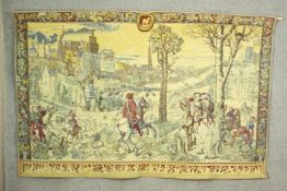 A machine woven tapestry, probably Belgian, depicting figures on horseback in front of a city. H.135
