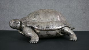 An 800 standard silver large model of a tortoise with engraved detailing and hinged shell. Stamped