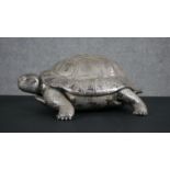 An 800 standard silver large model of a tortoise with engraved detailing and hinged shell. Stamped