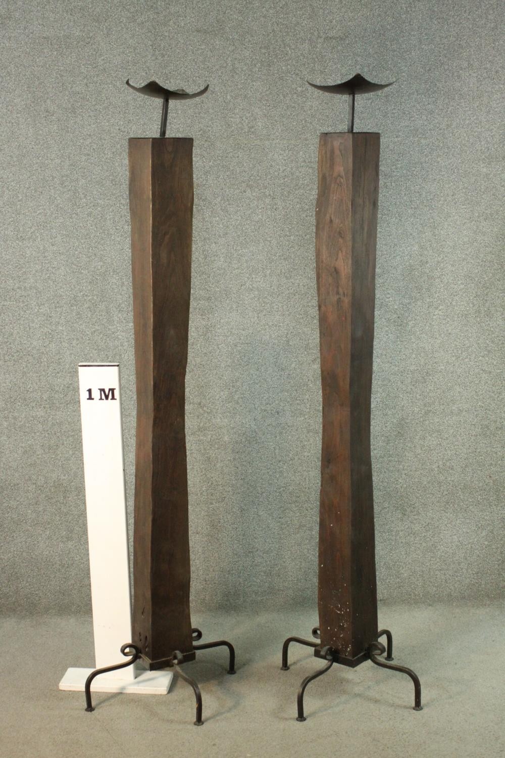 A pair of large Oriental style hardwood and wrought iron floor standing candlesticks on four prong - Image 9 of 9