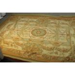An Aubusson beige ground hand made carpet. L.365 W.273cm.